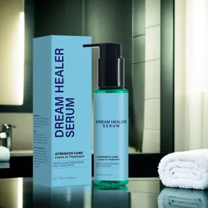 Primer plano del frasco de suero capilar Dream Healer 100ml y su embalaje en caja azul a juego
