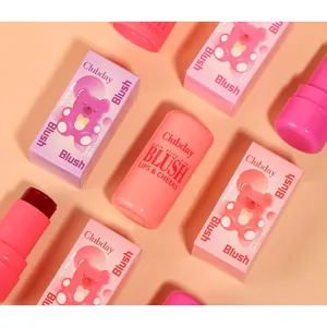 Detailed top view of Clubday 2-in-1 blush sticks and bear boxes in peach tones