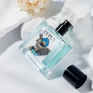 Detail view of Cupid Hypnosis perfume bottle featuring blue liquid and unique label