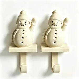 Par de ganchos para calcetines de Navidad con forma de muñeco de nieve