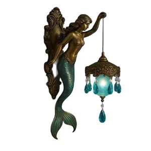 Artistic mermaid wall lamp in nautical bohemian style with blue crystal pendants