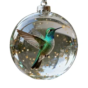 Boule de Noël en verre avec colibri 3D et étoiles dorées scintillantes