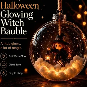 Enchanting Halloween glowing witch bauble with soft warm light and cloud base decoration.