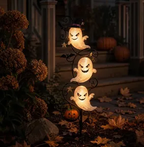 Glowing ghost garden stakes with warm LED lights for Halloween outdoor decor