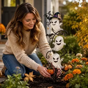 Solar Halloween ghost garden stake light with witch hat, bats and pumpkin decor