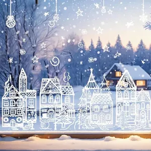 Détail d'autocollants de fenêtre village de Noël blanc avec maisons et flocons de neige