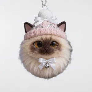Cute fluffy cat head plush ornament with pink knit hat and white bow for Christmas decor