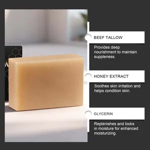 Close-up of beef tallow soap detailing ingredients: honey extract and glycerin for hydration.