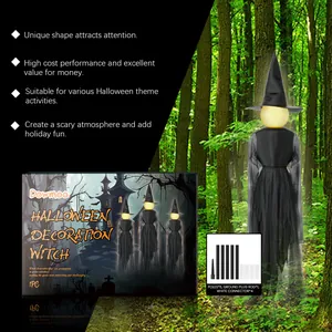 Close-up of Halloween glowing witch decoration with poles and ground plug accessories