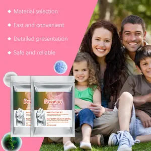 Detail of DOWMOO DIY hand casting kit packaging with happy family scene background