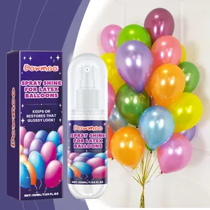 Close-up of Dowmoo balloon shine spray bottle and box with glossy colorful balloons