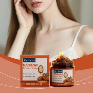 Détail du savon aux fleurs marocaines OceAura avec texture ambrée et emballage orange