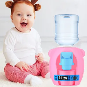 Children's mini water dispenser toy in pink and blue shown beside a smiling baby model.