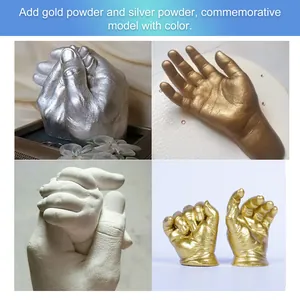 Detail showing finished 3D hand casting models in gold, silver and white plaster.