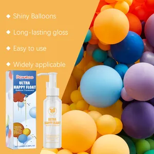 Botella de líquido para globos DOWMOO y caja sobre un fondo de fiesta de colores vivos