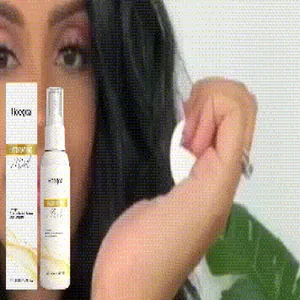 Close-up detail of HOEGOA hydrating mist spray bottle and elegant white packaging