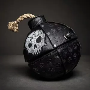 Detailed view of a black leather pirate bomb bag with skull motif for Halloween.