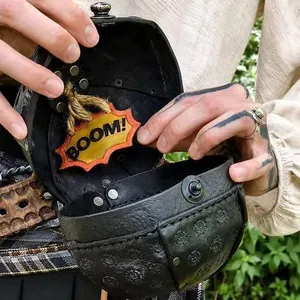 Close-up of pirate bomb bag interior featuring BOOM! tag and leather texture