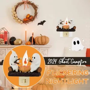 Close-up of Ghost Campfire Flickering Nightlight with two ghosts roasting marshmallows.