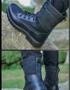 Vistas detalladas de botas tácticas negras duraderas en un terreno rocoso al aire libre.