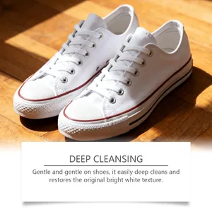 Detail showing deep cleansing results on white canvas sneakers with clear texture