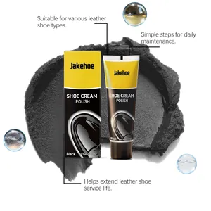 Professional detail view of Jakehoe black leather shoe cream polish packaging and texture