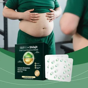 Close-up view of Shilajit essence beads softgels with green and gold dual-core design