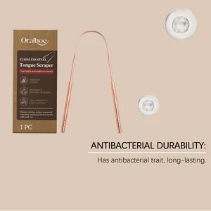 Stainless steel U-shaped tongue scraper detail with copper finish and packaging.