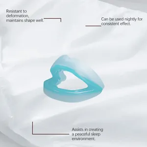 Close-up of a blue anti-grinding mouthguard on a soft white background for sleep care.