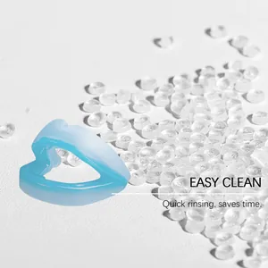 Detail view of easy clean blue and white dental night guard for teeth grinding protection