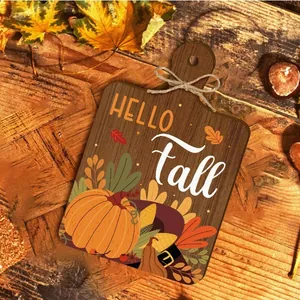 Rustic wooden Hello Fall plaque sign with pumpkin decor for autumn harvest party