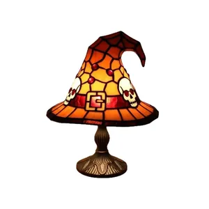 Tiffany style Halloween witch hat table lamp with orange stained glass and skull design