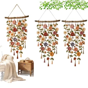 Handmade crochet floral vine wall hanging with colorful blooms for boho home decor