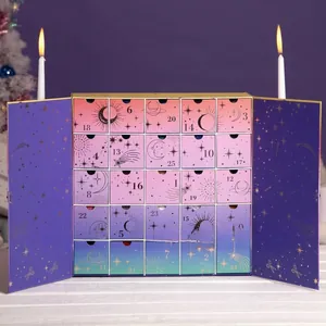 Calendario de Adviento celestial con 25 cajones degradados y motivos de luna y sol