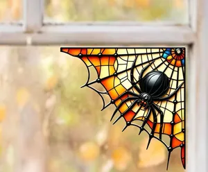 Detail view of a Halloween stained glass spider web corner ornament with black spider