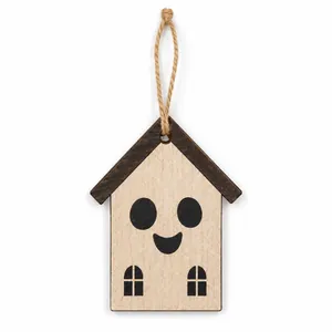 Close-up of wooden house Halloween hanging ornament with a cute ghost face design