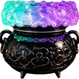 Close-up detail of Halloween LED bubble light cauldron with colorful glowing orbs