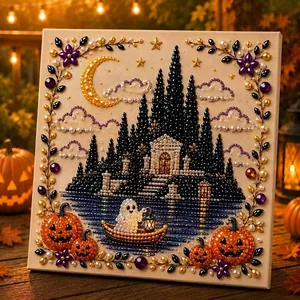 Detailed close-up view of DIY Halloween pearl art kit with ghost, pumpkins and castle.