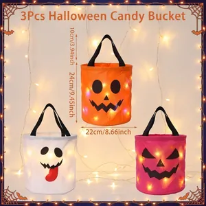 Set of 3 glow-in-the-dark Halloween candy buckets with festive ghost pumpkin designs