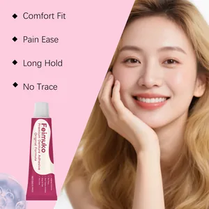 Detail view of Feimuko premium denture adhesive tube featuring a smiling Asian woman.