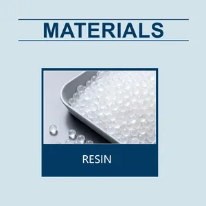 Macro detail of translucent white resin beads for denture repair finishing set