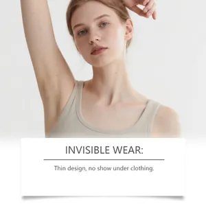 Professional model wearing thin invisible underarm sweat pads under a beige tank top