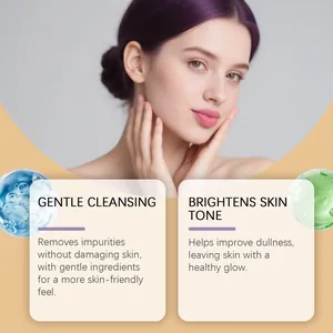 Asian woman showing glowing skin from gentle turmeric facial cleanser highlights