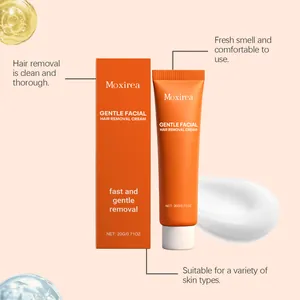 Moxirea Gesichtsenteisungscreme im Detail mit oranger Tube und Verpackungsschachtel