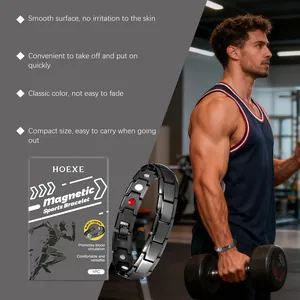 Black magnetic therapy sports bracelet worn by an athlete during gym workout session