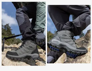 Detailed view of SkyPilot high-top waterproof hiking boots with anti-slip soles on rocks.