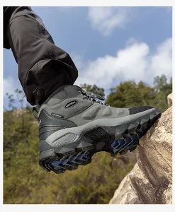 Side view of SkyPilot waterproof hiking boot showing durable sole on a rocky terrain