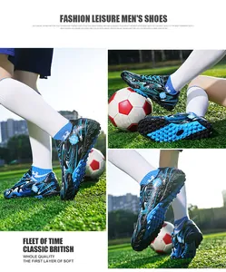 Professional blue marbled soccer shoes for men and youth in an outdoor field setting