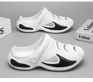 Breathable white clogs for men with black accents, ideal for beach and casual outdoor wear.