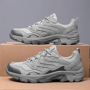 Durable grey outdoor hiking shoes with breathable mesh and anti-slip rubber soles